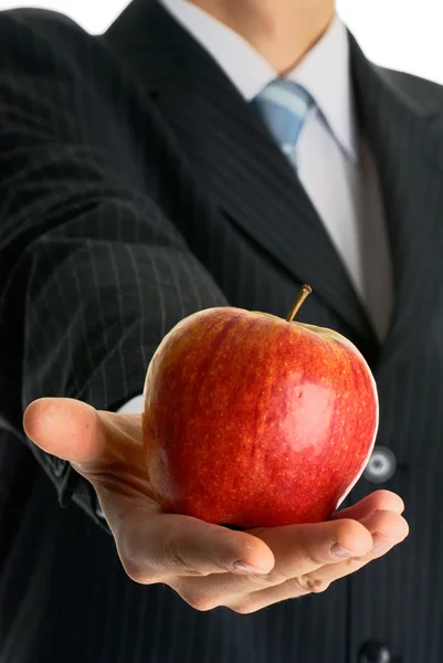 リンゴを持ったビジネスマン — ストック写真