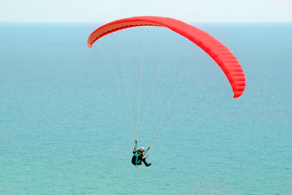 stock image Paraglider over sea