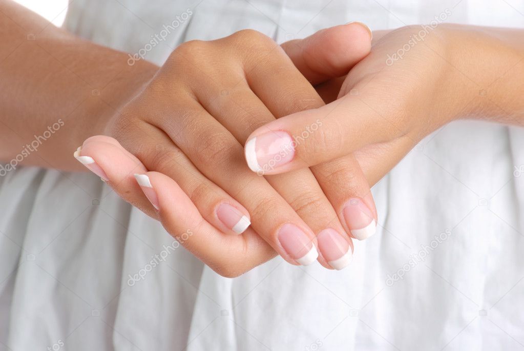 Girl hands on the white dress background