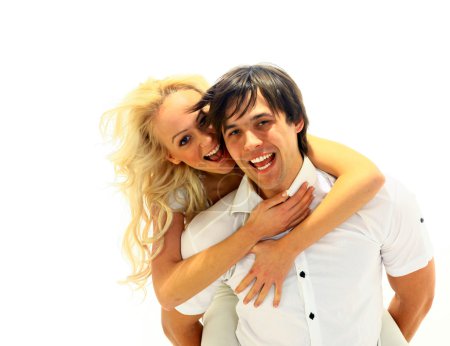 Joyeux couple souriant amoureux. Sur fond blanc 