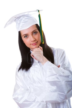 Jeune diplômé isolé sur le blanc 