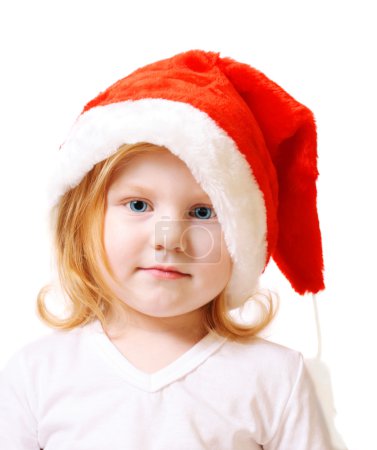 Petite fille en chapeau de Noël 