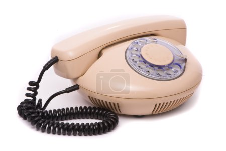 Vieux téléphone isolé sur fond blanc 