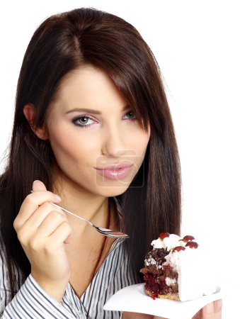Jeune belle femme avec un gâteau .