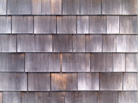 Mur de tuiles de bois à l'extérieur d'une maison 